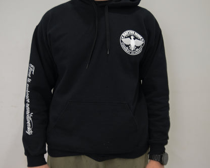 Black hoodie with a logo on the chest and text on the sleeve against a plain background